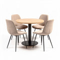 Round wooden dining table set with four fabric upholstered chairs in beige