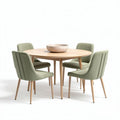 Round dining table set with four upholstered chairs in green fabric 120 x 120 x 75cm