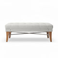 Upholstered fabric ottoman with wooden legs and metal base 90 x 45 x 40cm